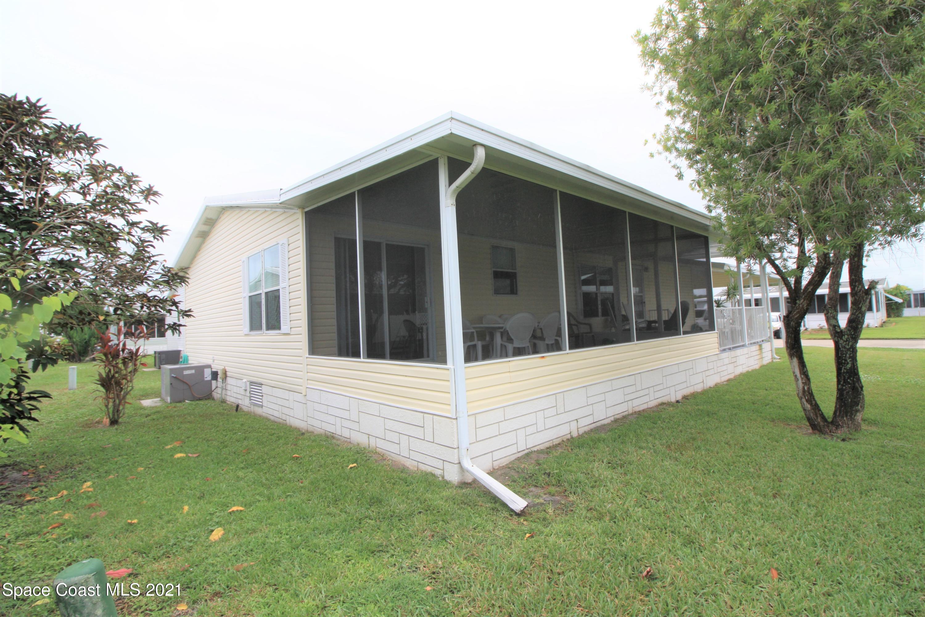 7541 Cedar Bark Road Micco, FL 32976 - Photo 19 of 20 Screen Enclosed Porch