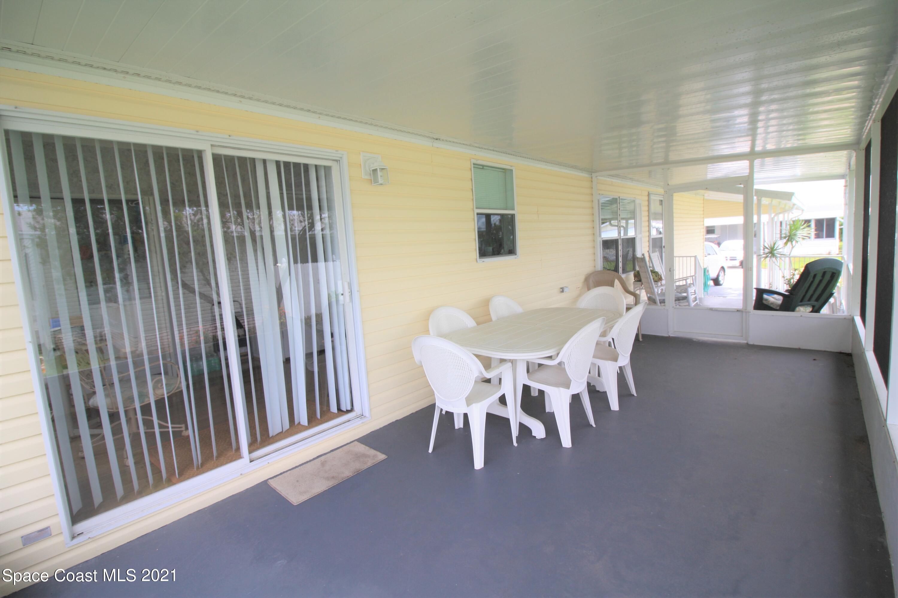 7541 Cedar Bark Road Micco, FL 32976 - Photo 4 of 20 Screened Porch
