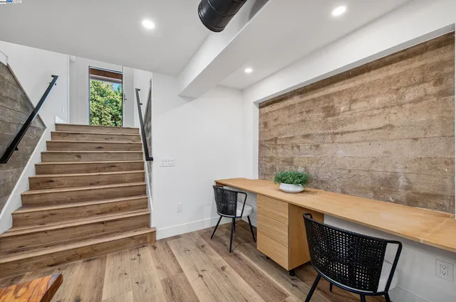 a kitchen with a sink and a stove top oven