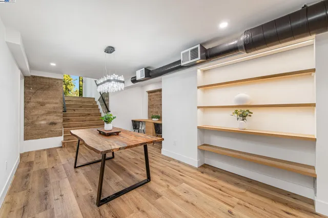 a view of entryway with wooden floor