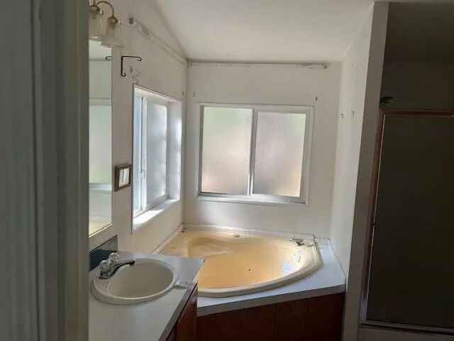 a bathroom with a sink and a bathtub