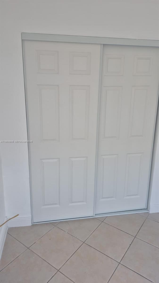 3355 West 68th Street, Unit 119 Hialeah, FL 33018 - Photo 7 of 11 a view of an empty room