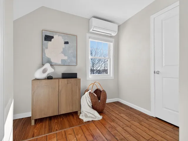 a bathroom with a sink a mirror and a toilet