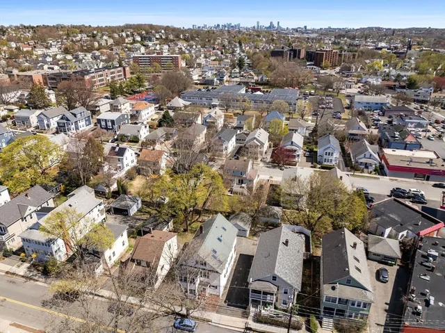 an aerial view of a city with lots of residential buildings
