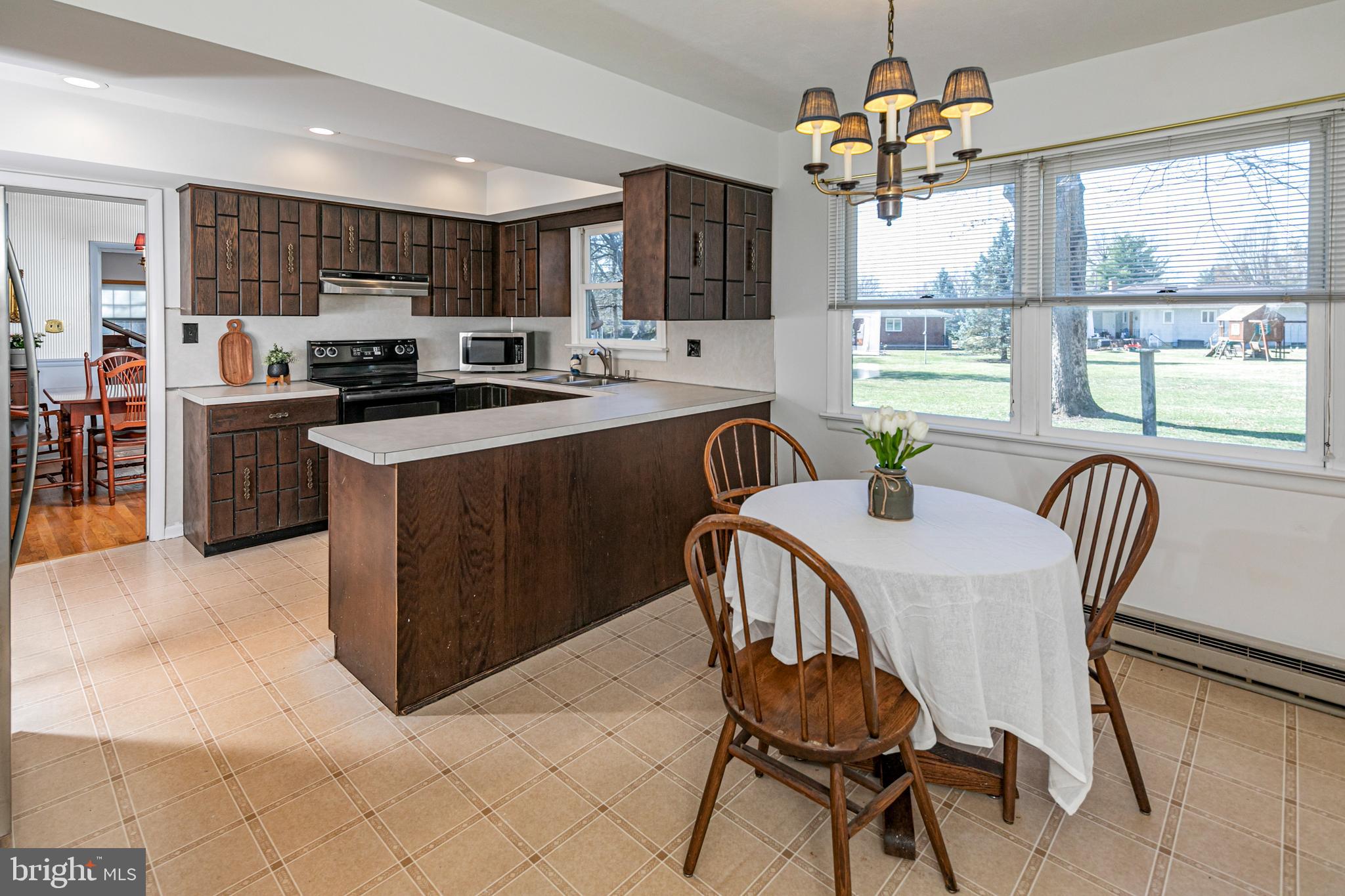 110 Johnstone Drive Pennington, NJ 08534 - Photo 13 of 31 a view of a dining room with furniture window and outside view