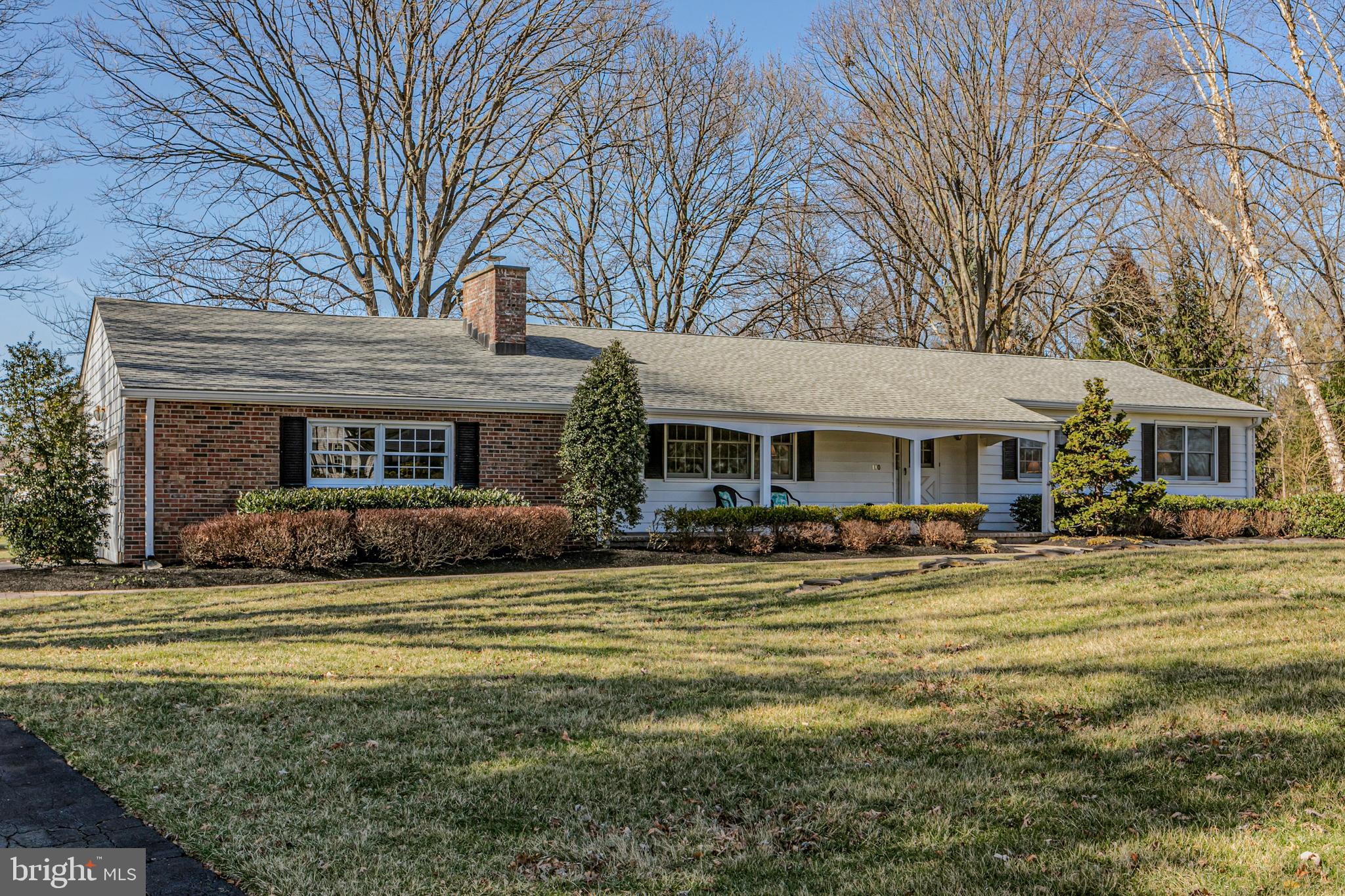 110 Johnstone Drive Pennington, NJ 08534 - Photo 2 of 31 a front view of a house with swimming pool