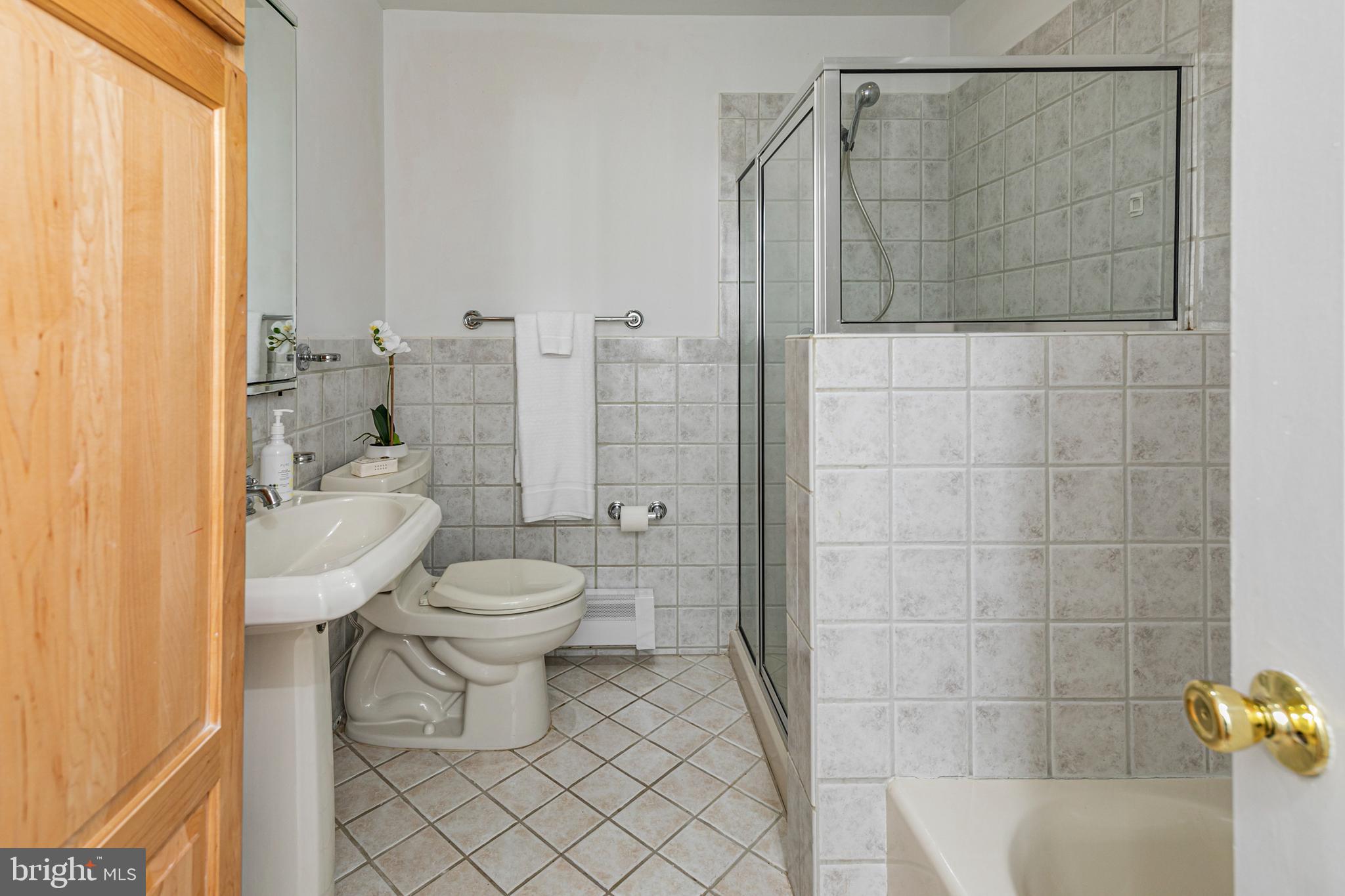 110 Johnstone Drive Pennington, NJ 08534 - Photo 24 of 31 a bathroom with a toilet and shower