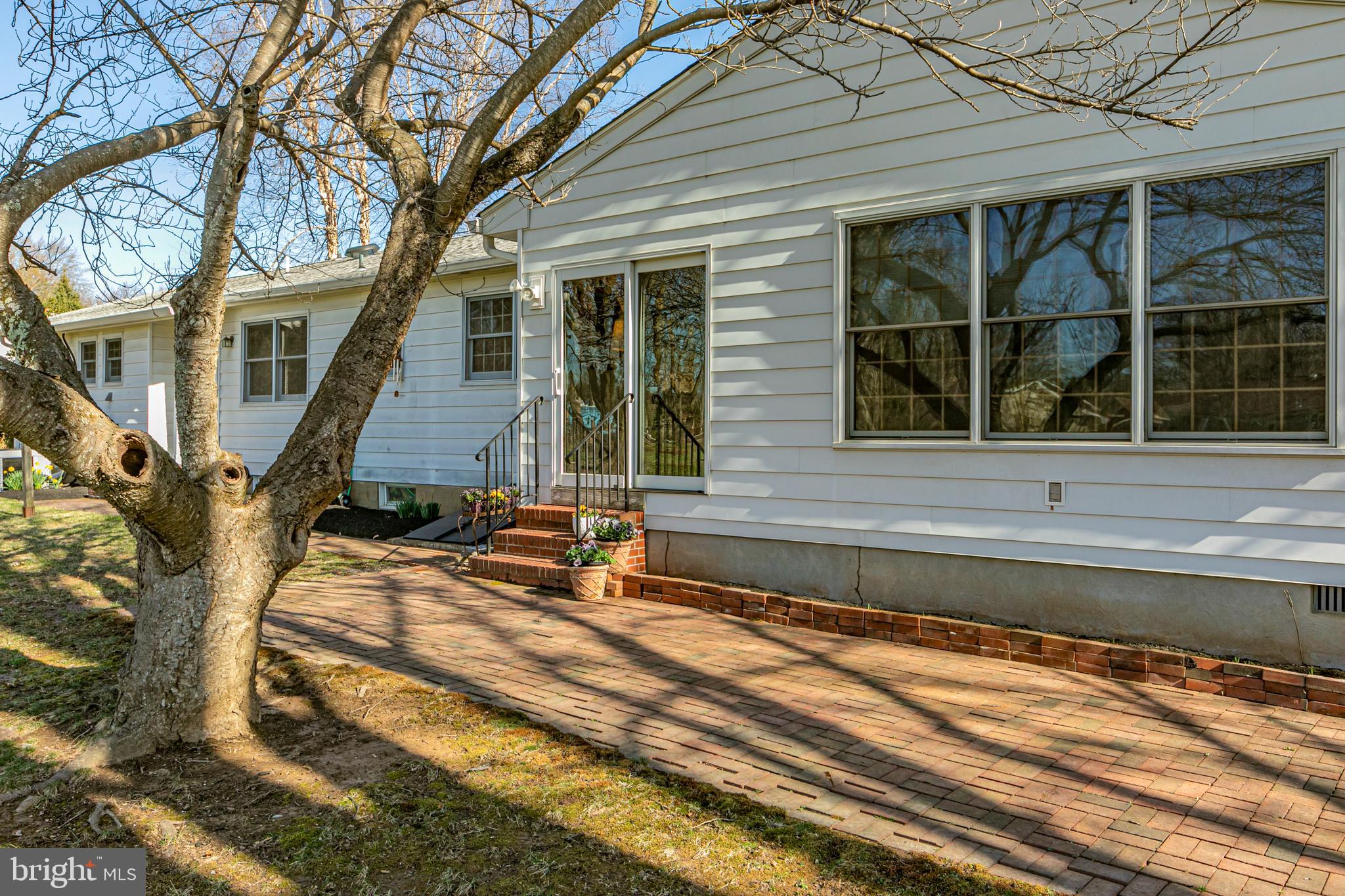 110 Johnstone Drive Pennington, NJ 08534 - Photo 26 of 31 a front view of a house with a yard