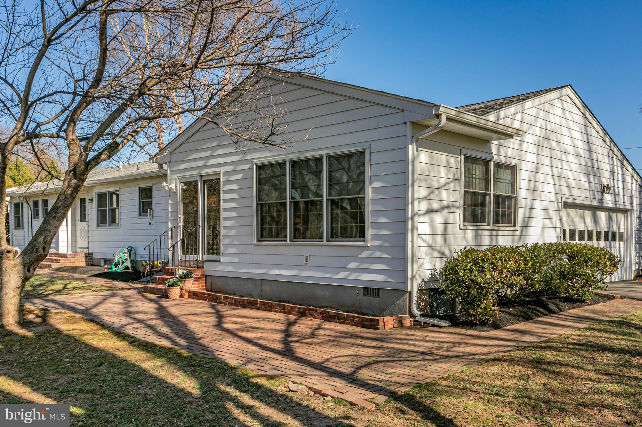 110 Johnstone Drive Pennington, NJ 08534 - Photo 27 of 31 a front view of a house with garden