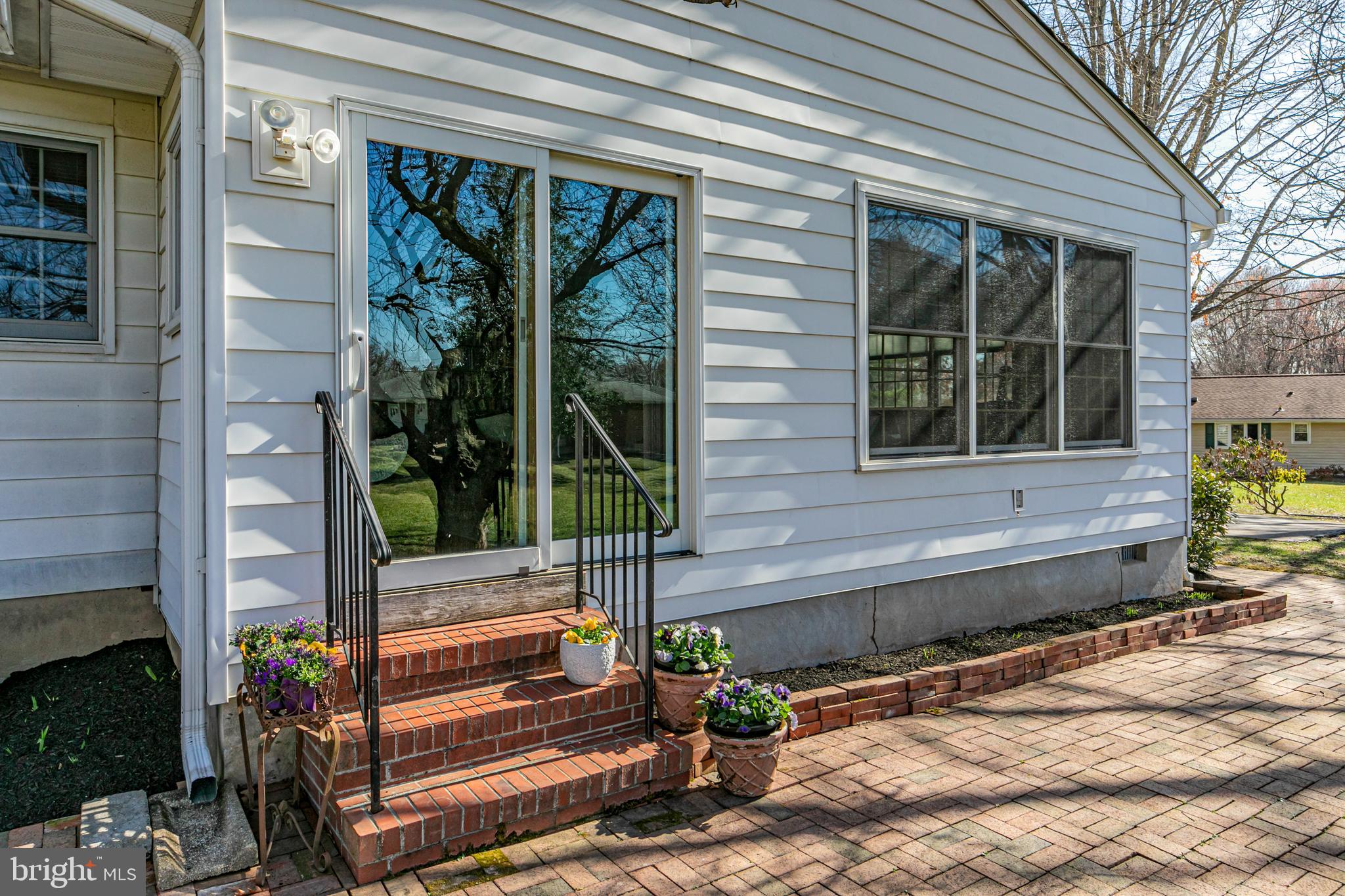 110 Johnstone Drive Pennington, NJ 08534 - Photo 28 of 31 a backyard of a house with seating space