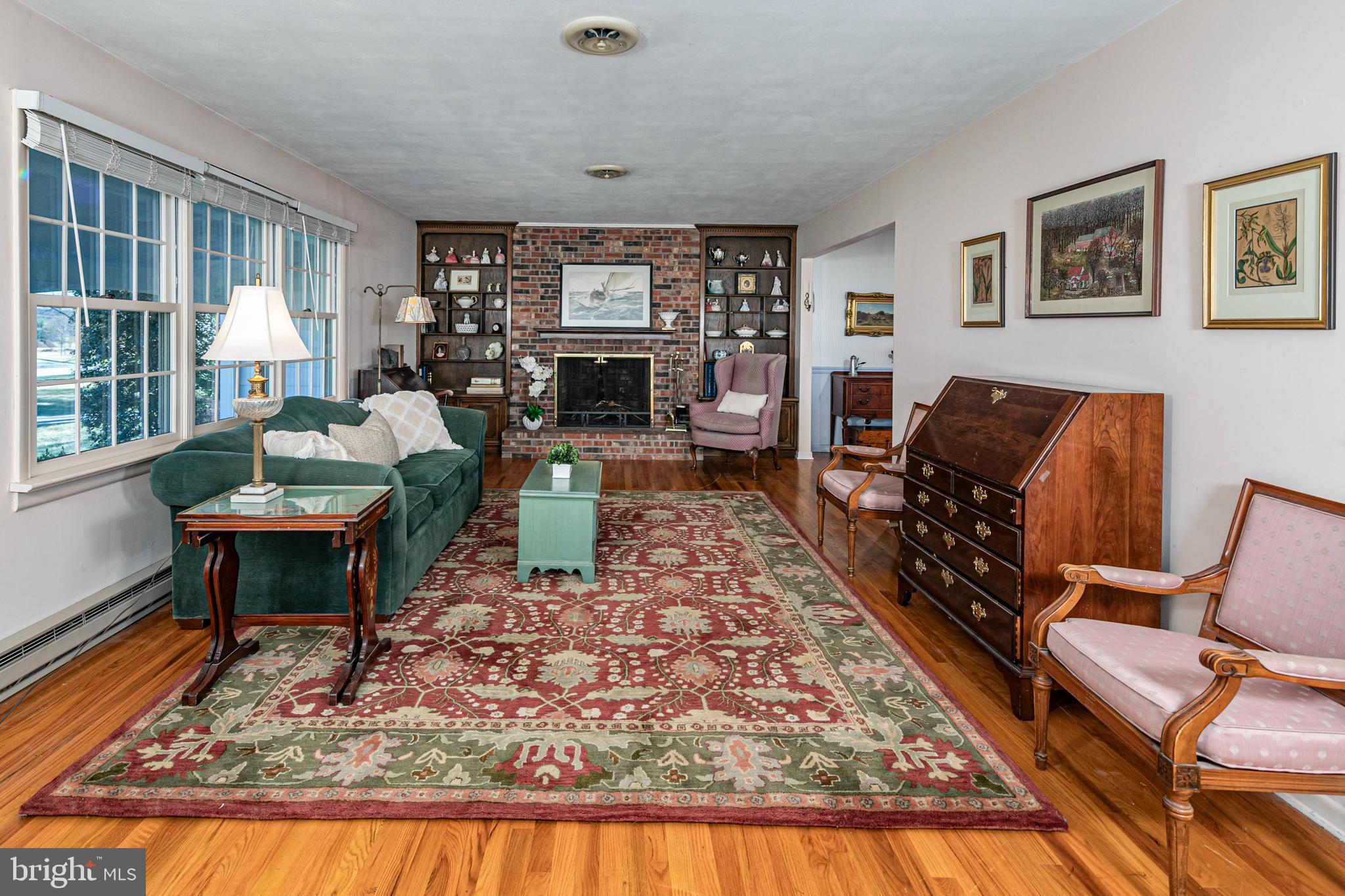 110 Johnstone Drive Pennington, NJ 08534 - Photo 7 of 31 a living room with furniture and a rug