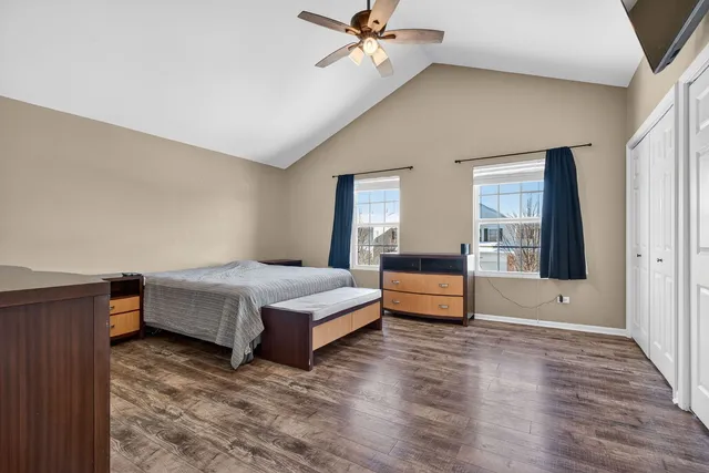 a bedroom with furniture and window