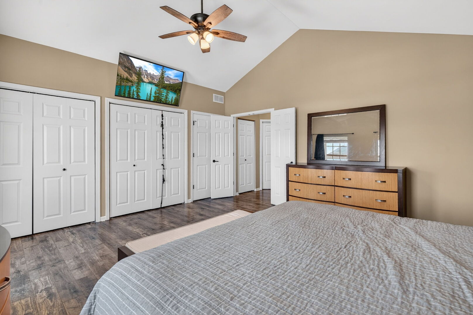 15238 Kenmare Circle Manhattan, IL 60442 - Photo 16 of 29 a bedroom with a bed and a chandelier