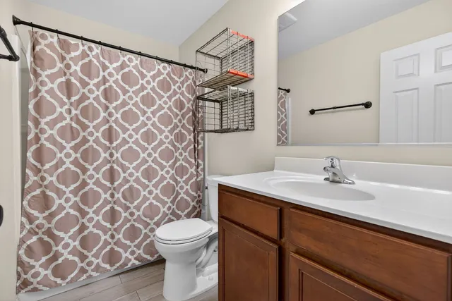 a bathroom with a sink and a toilet