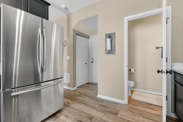 a view of bathroom with wooden floor