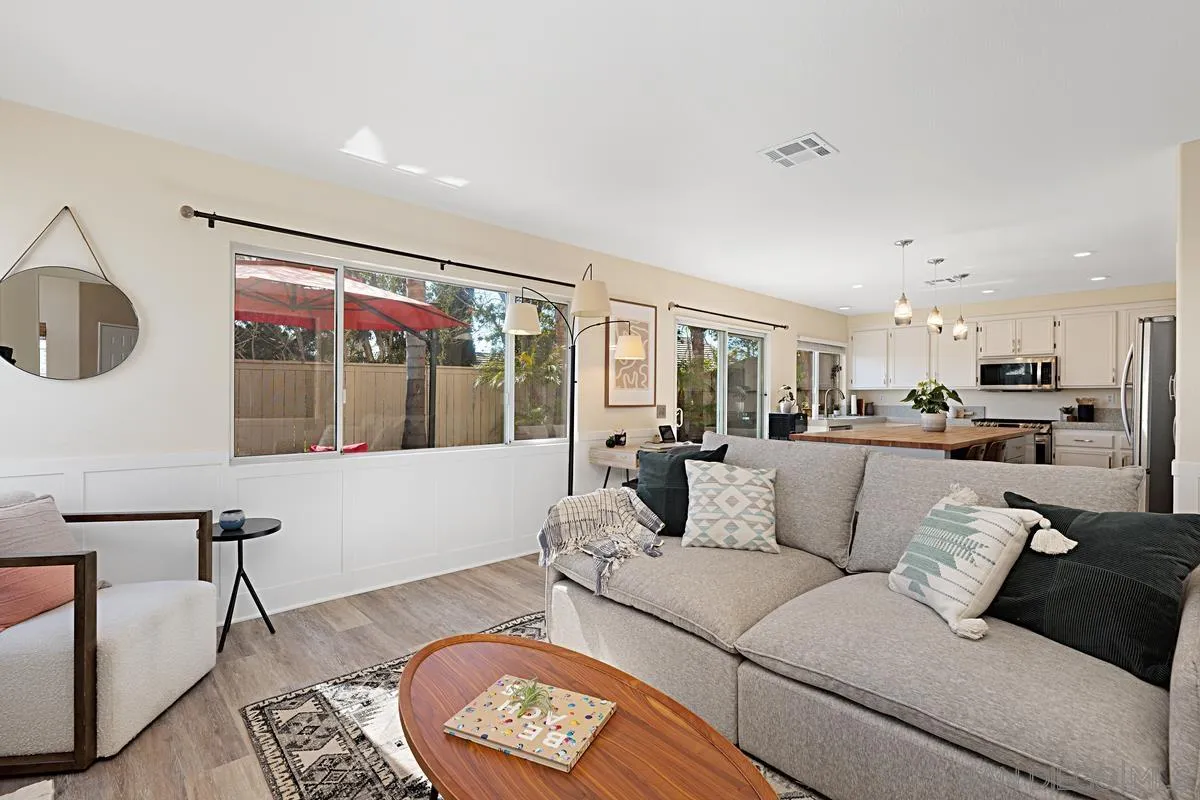 409 Helix Way Oceanside, CA 92057 - Photo 6 of 29 a living room with furniture and a large window