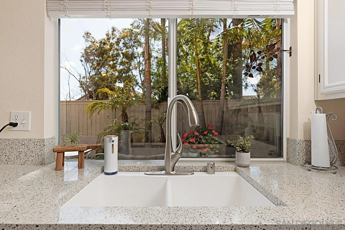 409 Helix Way Oceanside, CA 92057 - Photo 10 of 29 a room with a bench and mirror