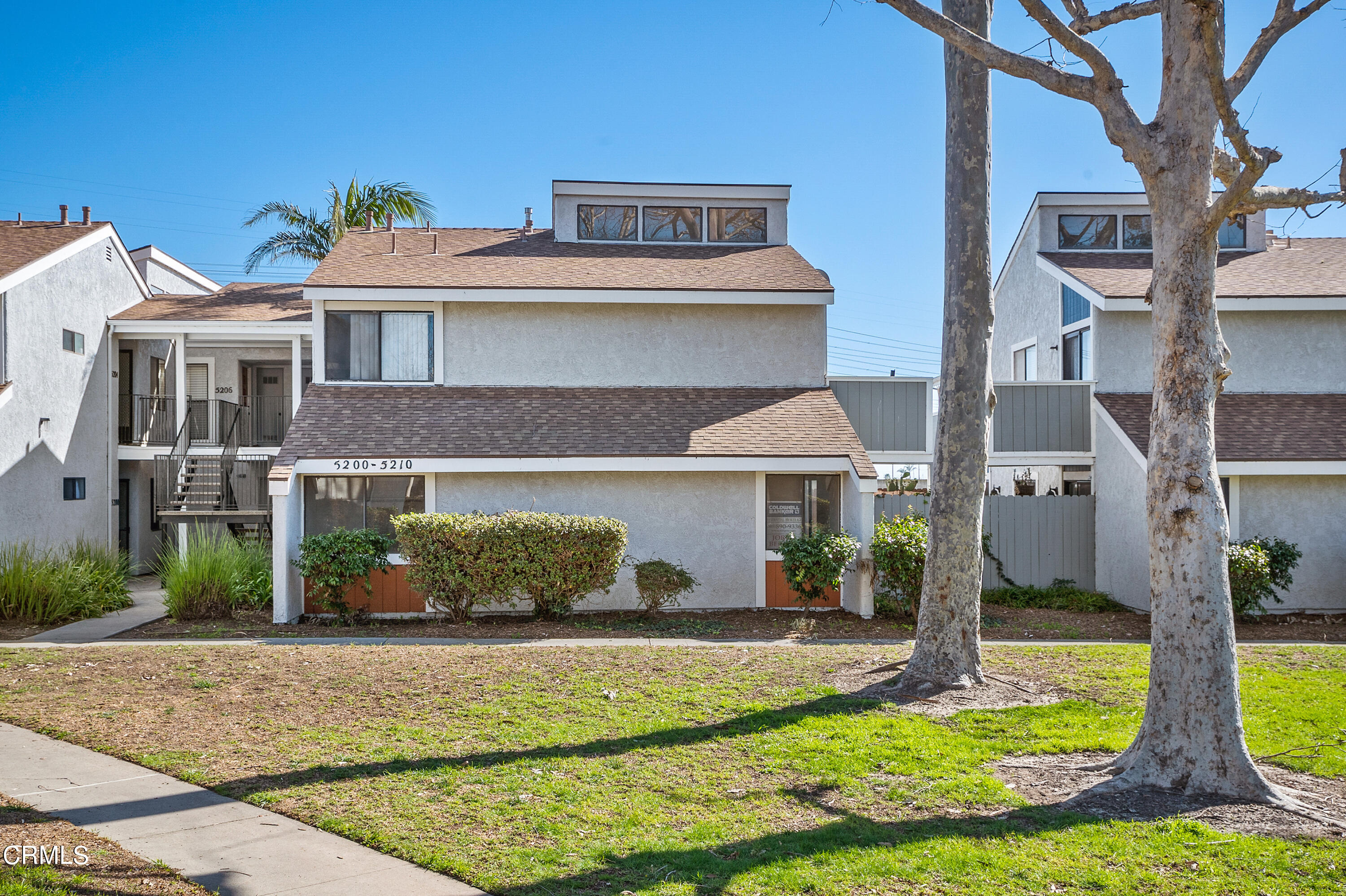 5202 Longfellow Way Oxnard, CA 93033 - Photo 1 of 21 a front view of a house with a yard