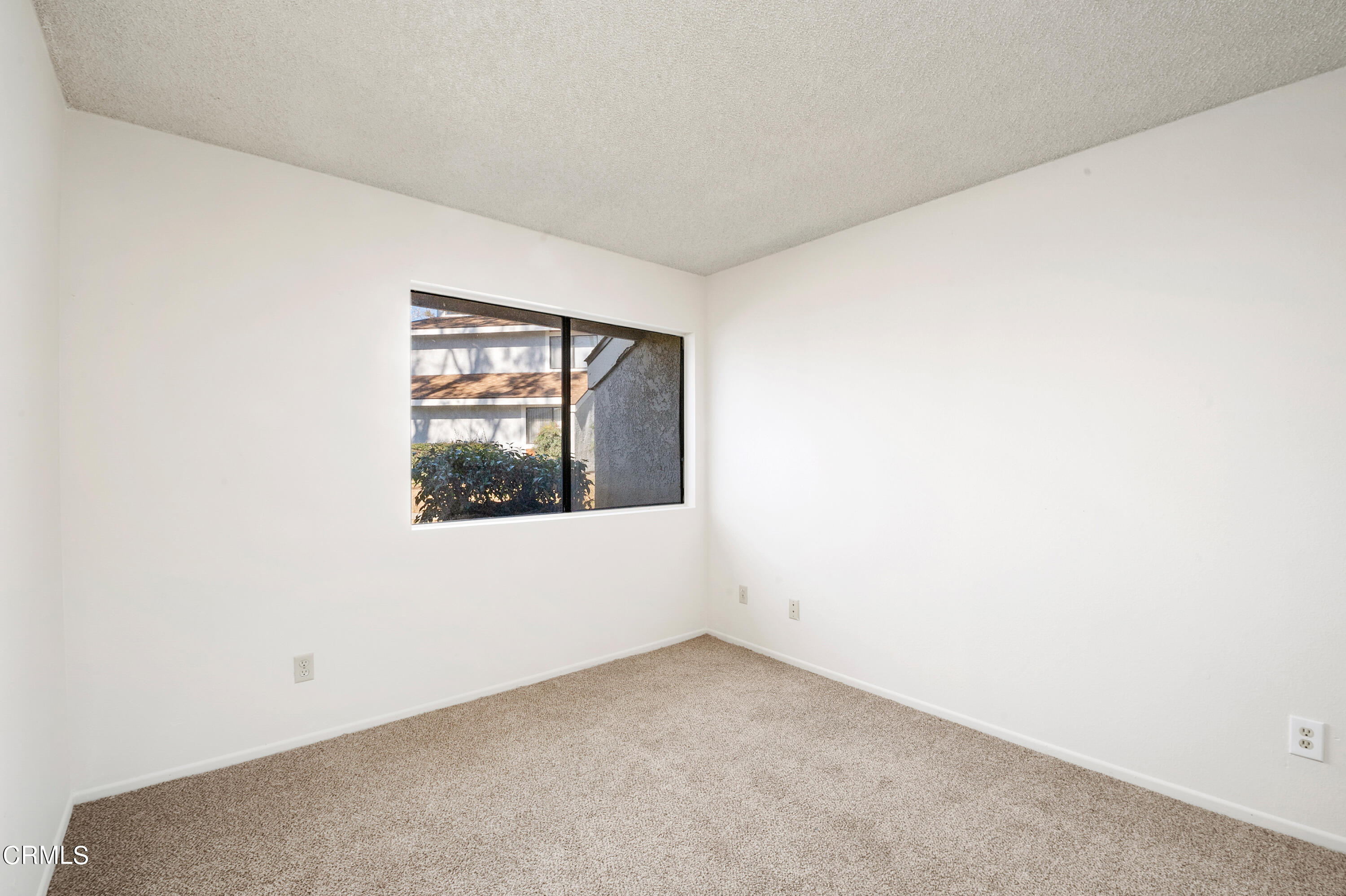 5202 Longfellow Way Oxnard, CA 93033 - Photo 11 of 21 a view of an empty room with a window