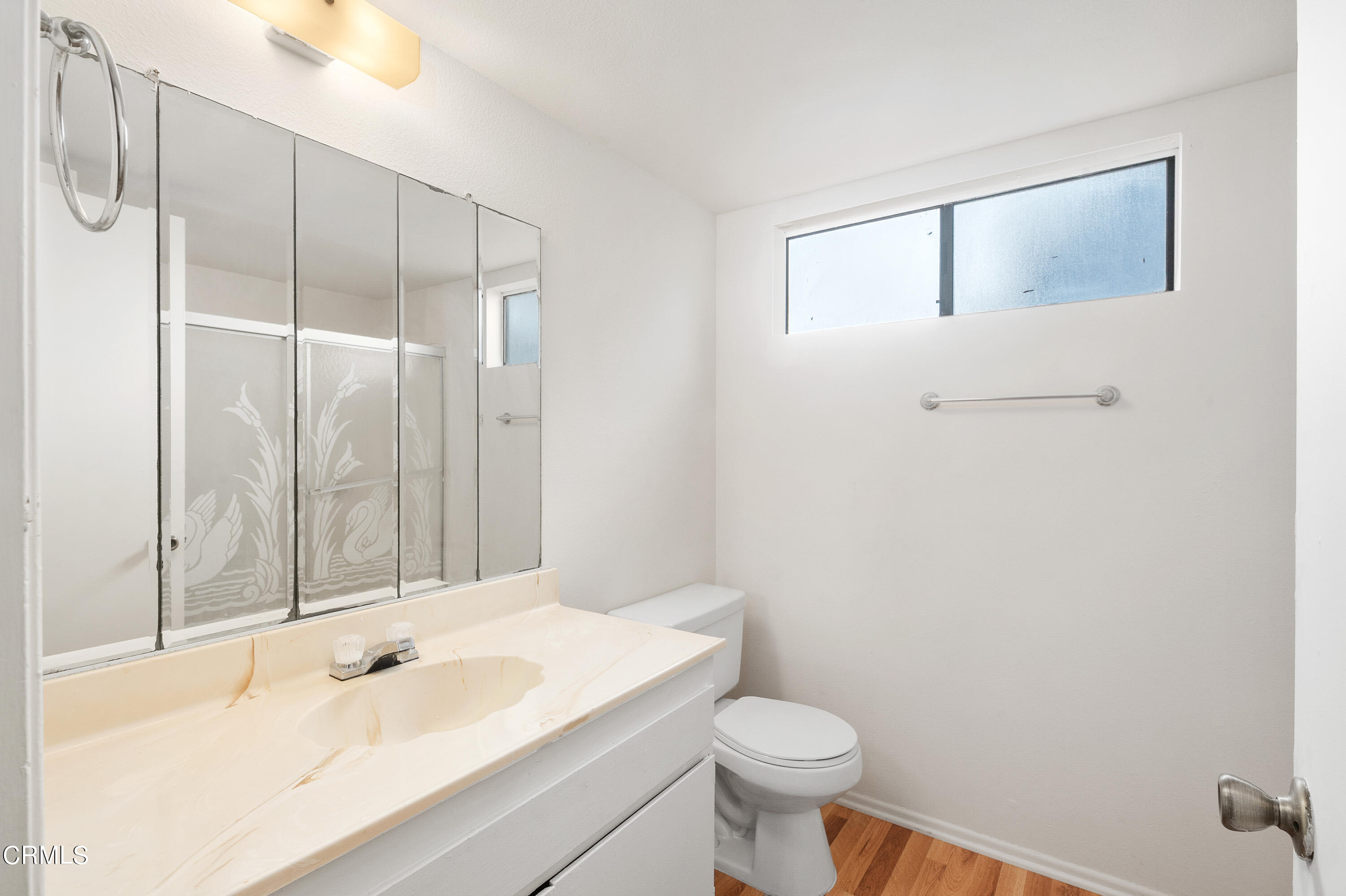 5202 Longfellow Way Oxnard, CA 93033 - Photo 12 of 21 a bathroom with a sink toilet and shower