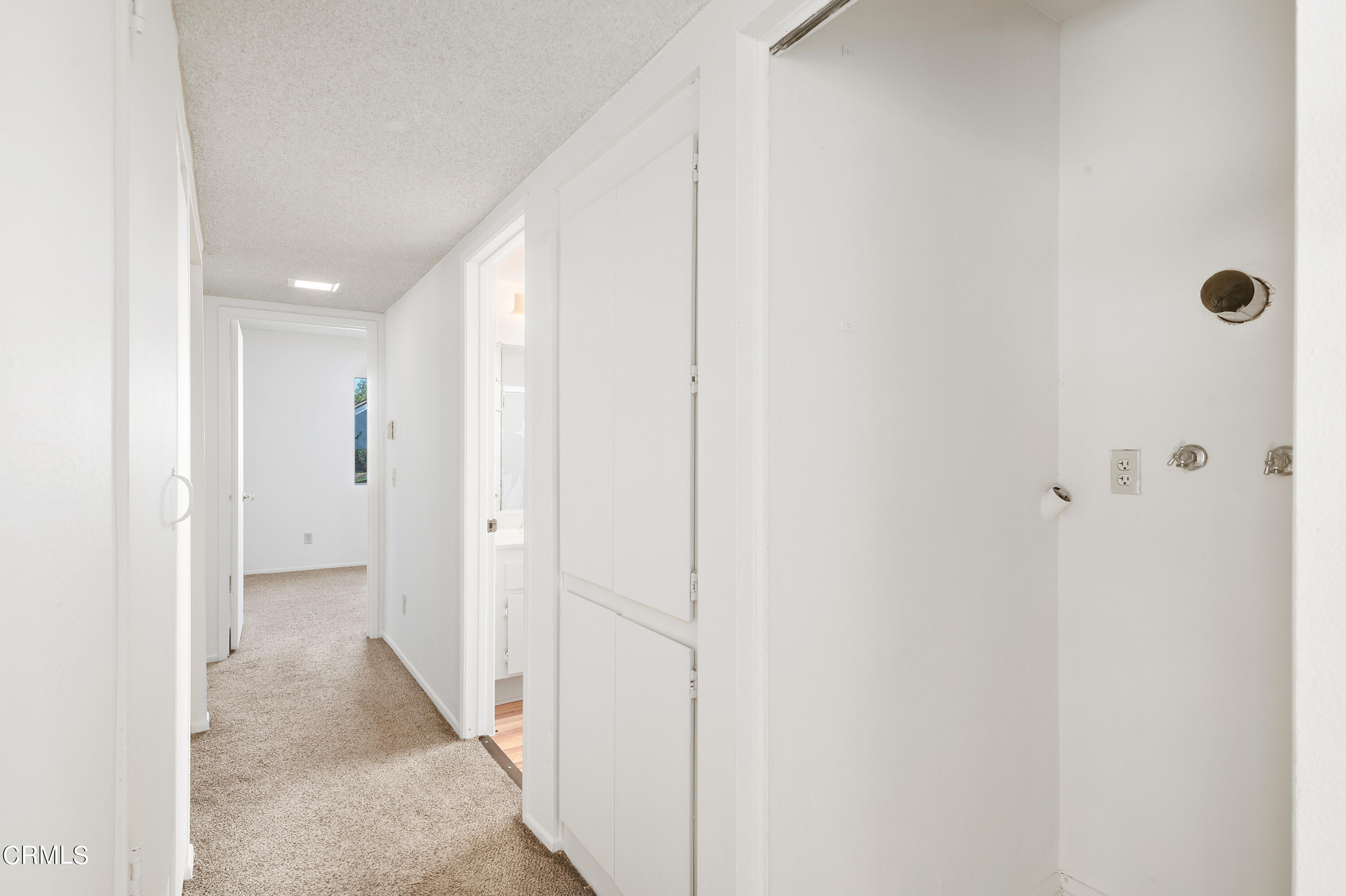 5202 Longfellow Way Oxnard, CA 93033 - Photo 13 of 21 a view of a hallway with closet