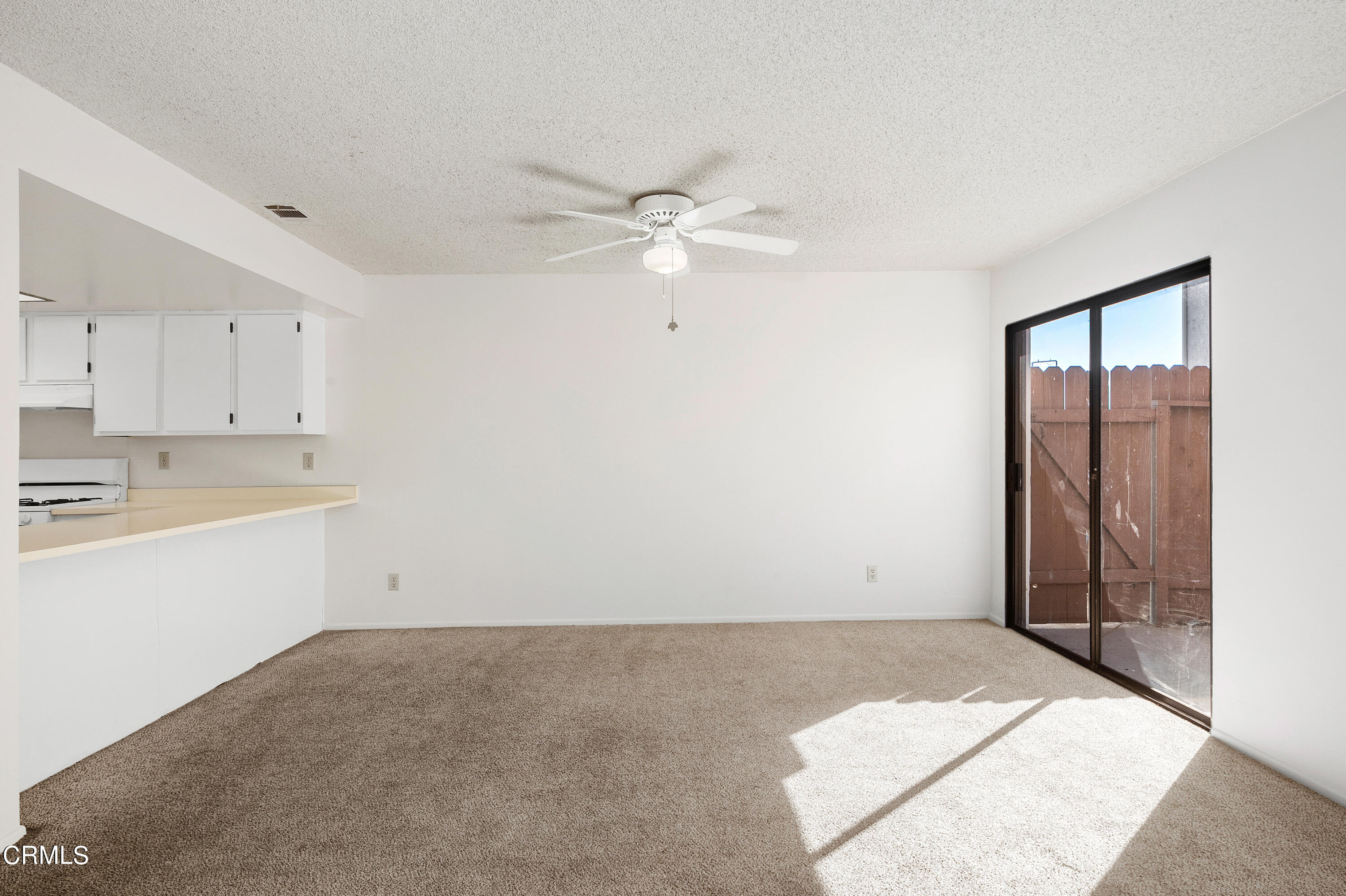 5202 Longfellow Way Oxnard, CA 93033 - Photo 5 of 21 a view of a kitchen with marble kitchen sink and refrigerator