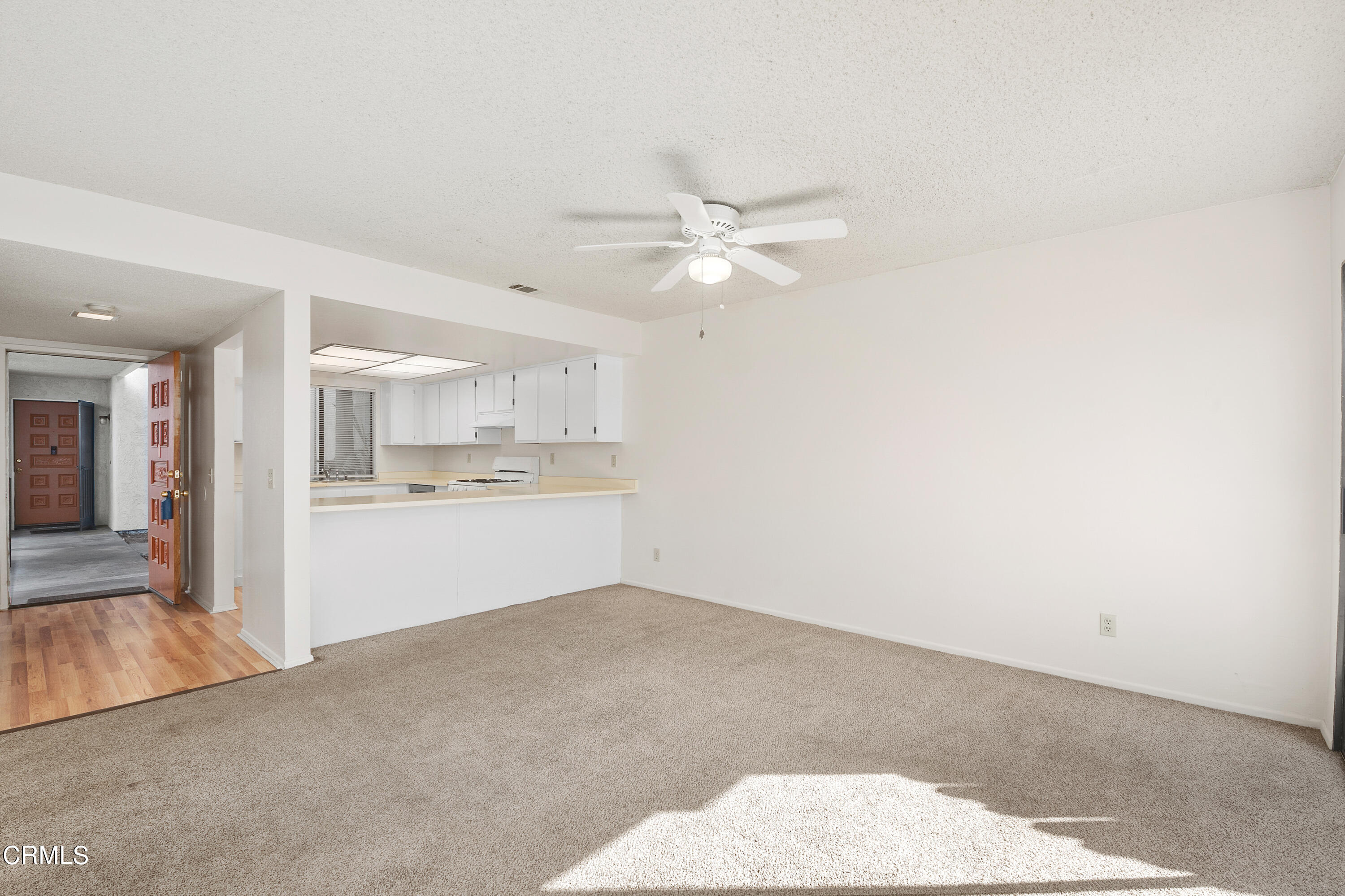 5202 Longfellow Way Oxnard, CA 93033 - Photo 6 of 21 a view of a kitchen with a sink dishwasher and a refrigerator