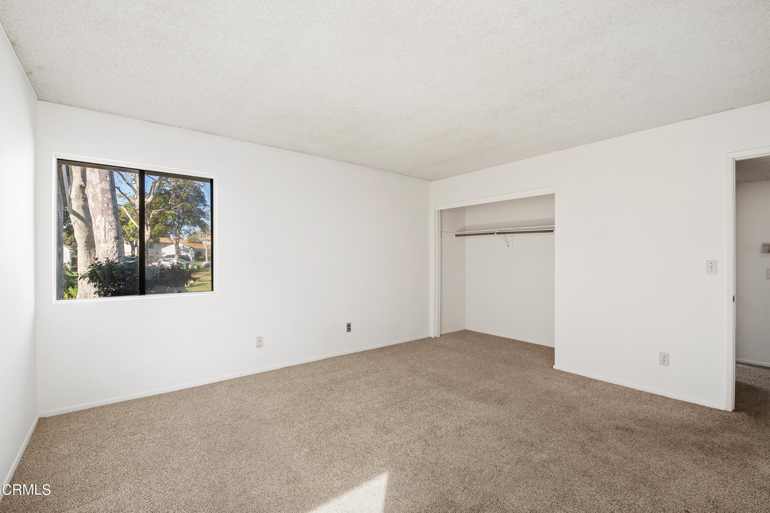 5202 Longfellow Way Oxnard, CA 93033 - Photo 10 of 21 an empty room with a window