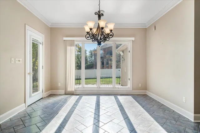a view of room with window and shelf