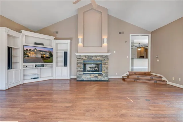 a view of livingroom with hardwood and furniture