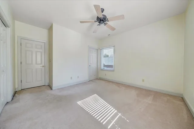 a view of a house with a yard and garage