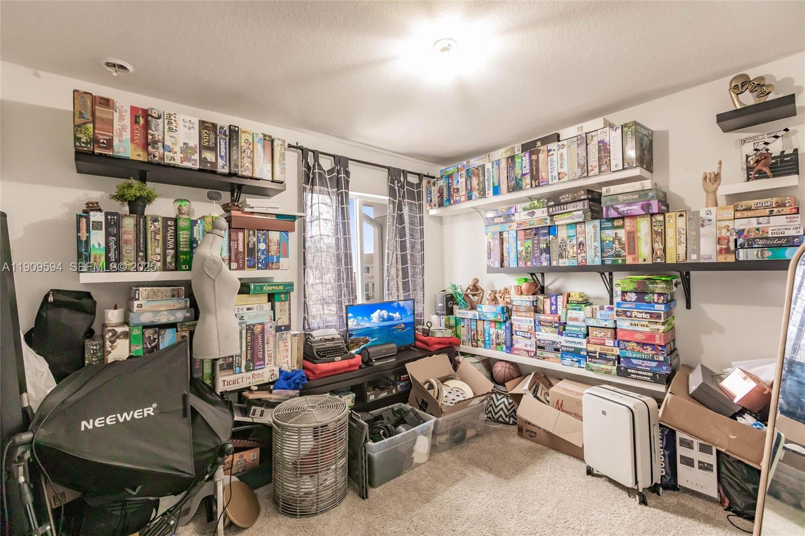 2333 Southeast 10th Street Homestead, FL 33035 - Photo 13 of 22 a room with furniture workspace and a window