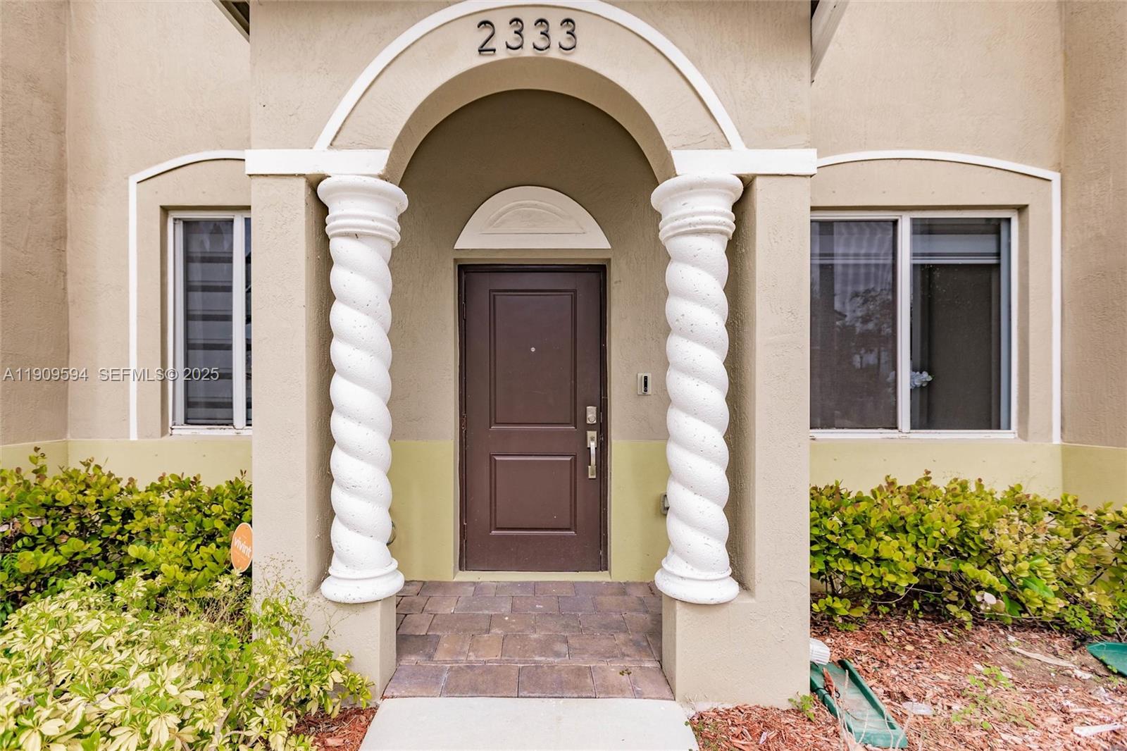 2333 Southeast 10th Street Homestead, FL 33035 - Photo 2 of 22 a front view of a house