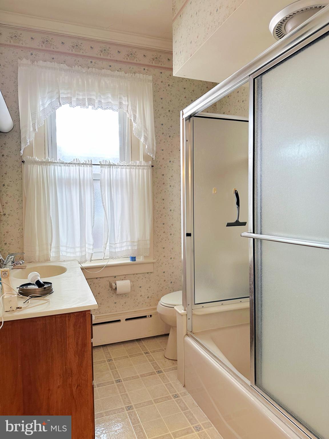 634 Main Street Red Hill, PA 18076 - Photo 30 of 34 a bathroom with a granite countertop sink toilet and shower