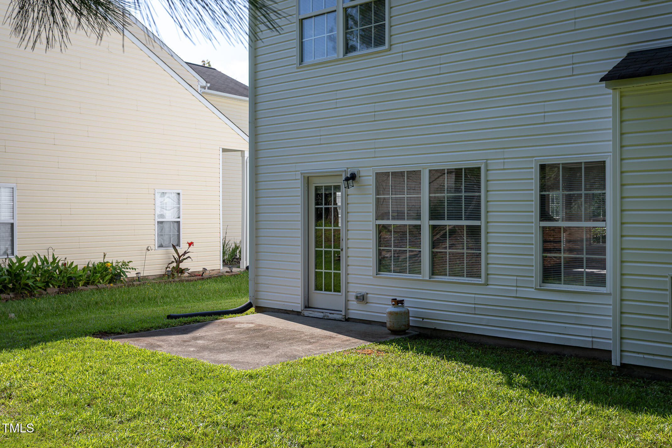 601 Weeping Willow Drive Durham, NC 27704 - Photo 34 of 36 front view of a house with a yard