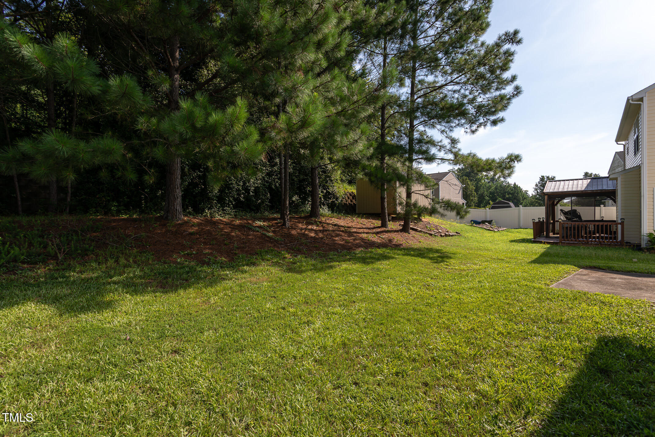 601 Weeping Willow Drive Durham, NC 27704 - Photo 36 of 36 a view of a park with swings and trees