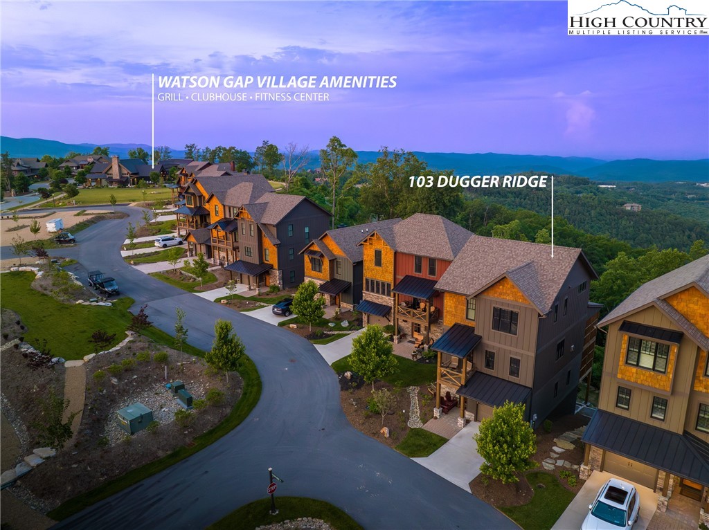 103 Dugger Rdg Trail Boone, NC 28607 - Photo 34 of 49 an aerial view of a house with a garden and lake view