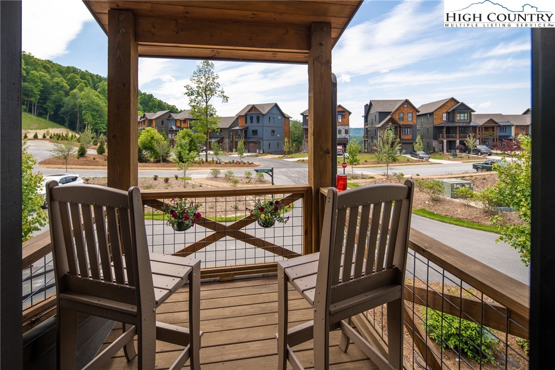 103 Dugger Rdg Trail Boone, NC 28607 - Photo 8 of 49 a view of a city from a balcony with furniture