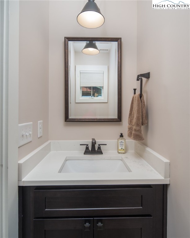 103 Dugger Rdg Trail Boone, NC 28607 - Photo 10 of 49 a bathroom with a sink and a mirror