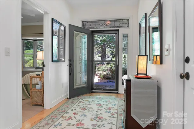 a view of an entryway with a door