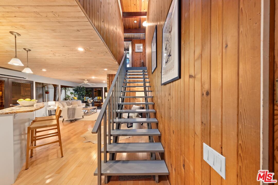 11612 Chenault Street, Unit 4 Los Angeles, CA 90049 - Photo 13 of 28 a view of entryway and hall with wooden floor