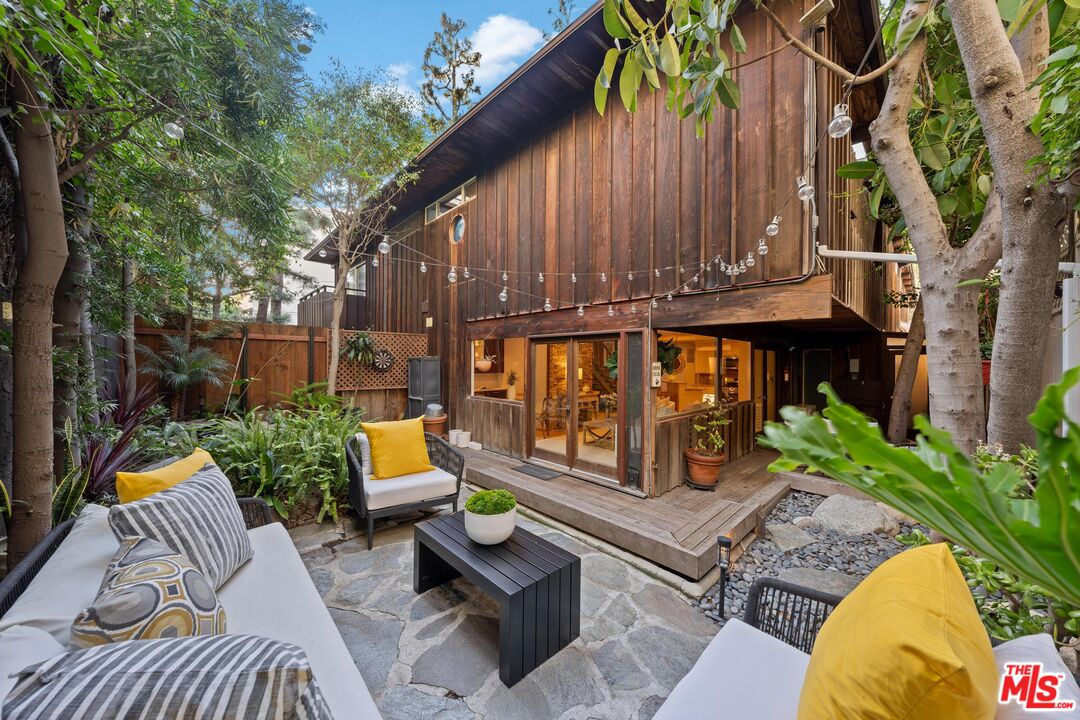 11612 Chenault Street, Unit 4 Los Angeles, CA 90049 - Photo 2 of 28 a view of a bench in the roof deck
