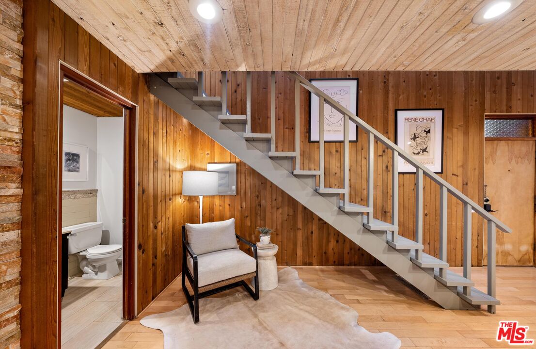 11612 Chenault Street, Unit 4 Los Angeles, CA 90049 - Photo 6 of 28 a view of entryway and hall with wooden floor