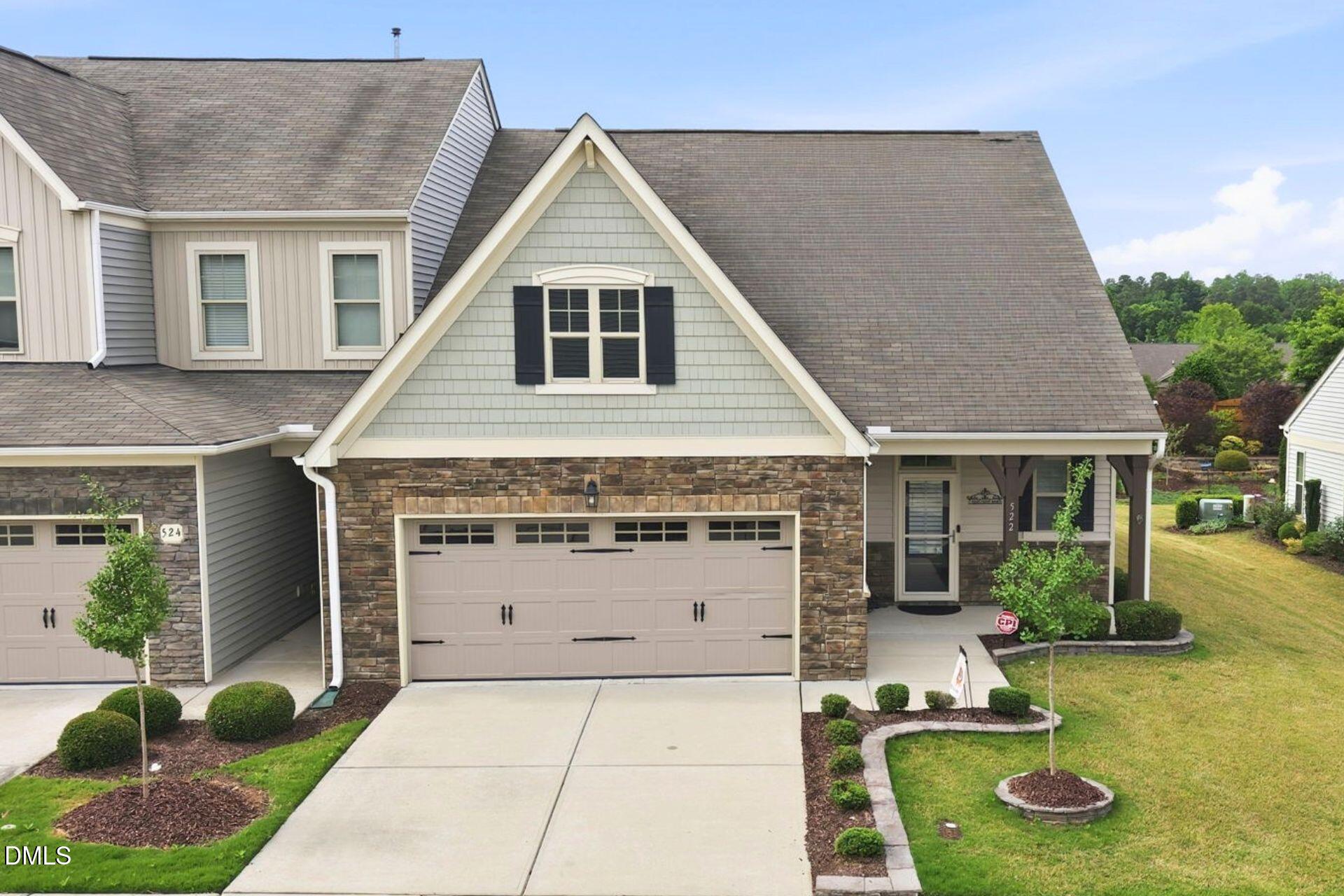 522 Brunello Drive Wake Forest, NC 27587 - Photo 21 of 24 a view of a house with a yard potted plants and a ceiling tree