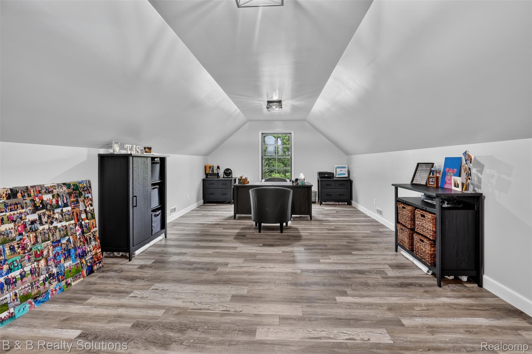 6204 Fish Lake Road North Branch, MI 48461 - Photo 40 of 79 Spacious attic space featuring wood-finish flooring and a central window