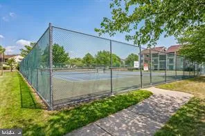 a view of a wall with paintings on the wall