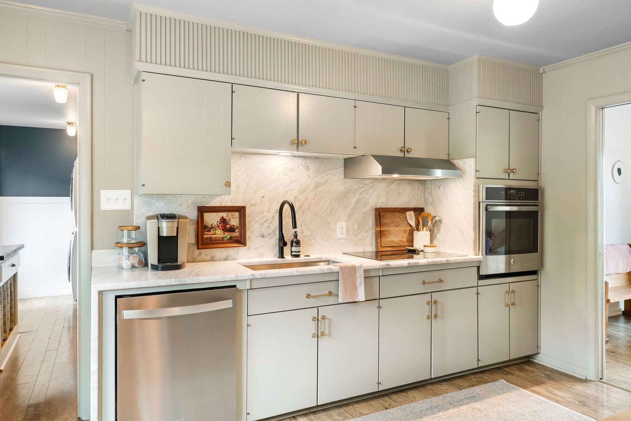 2337 Les Robinson Road Columbia, TN 38401 - Photo 12 of 35 a kitchen with stainless steel appliances granite countertop a sink stove and refrigerator