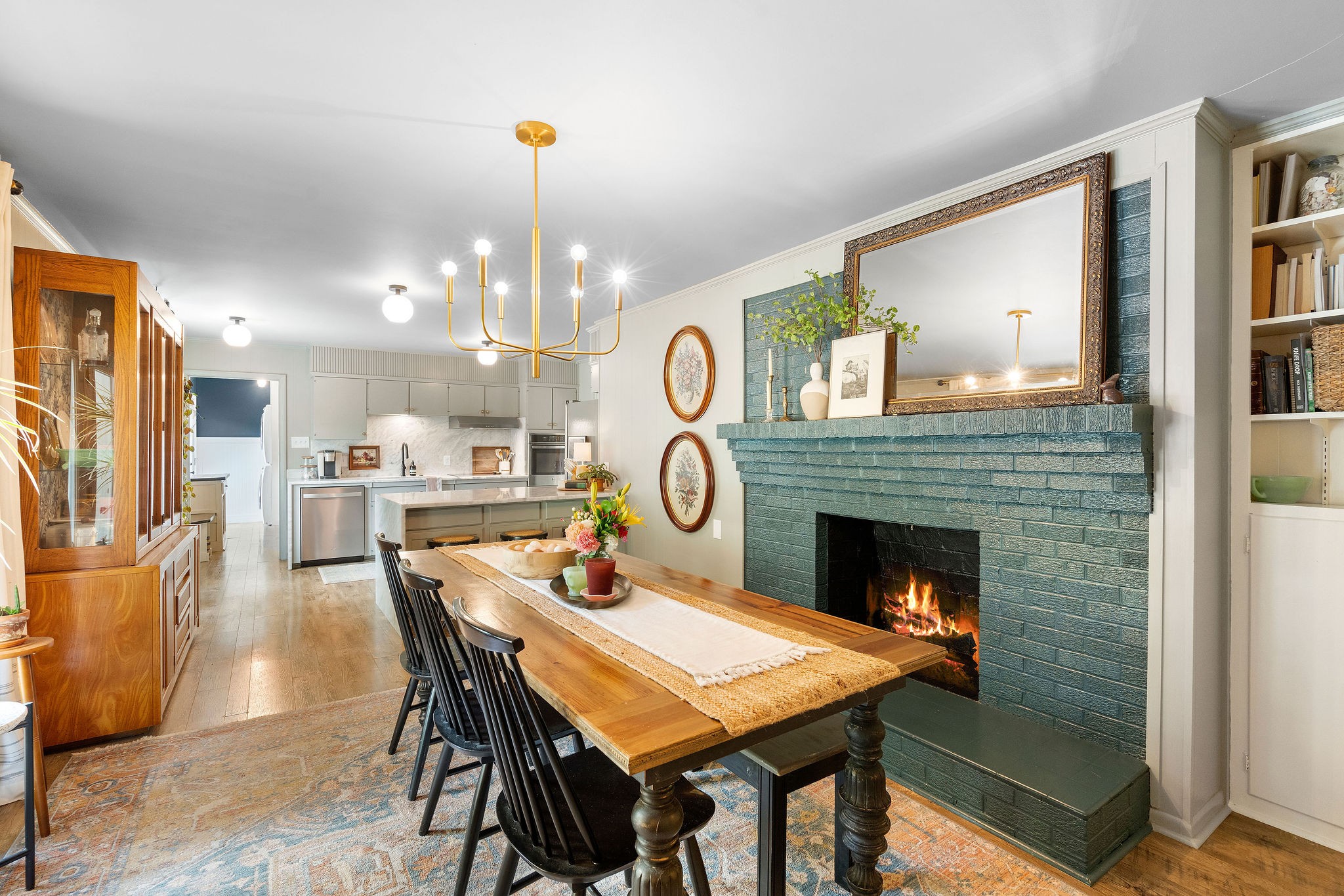 2337 Les Robinson Road Columbia, TN 38401 - Photo 16 of 35 a view of a dining room with furniture wooden floor and a chandelier