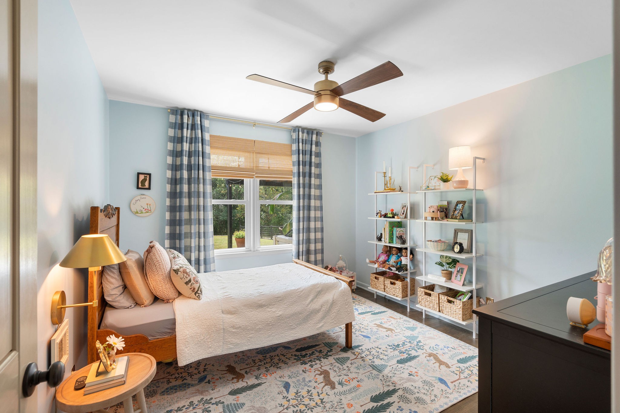 2337 Les Robinson Road Columbia, TN 38401 - Photo 20 of 35 a bedroom with a bed and wooden floor