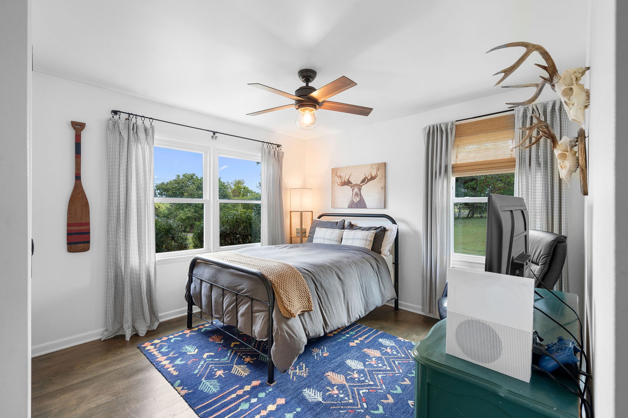 2337 Les Robinson Road Columbia, TN 38401 - Photo 23 of 35 a bedroom with a bed a couch and a window